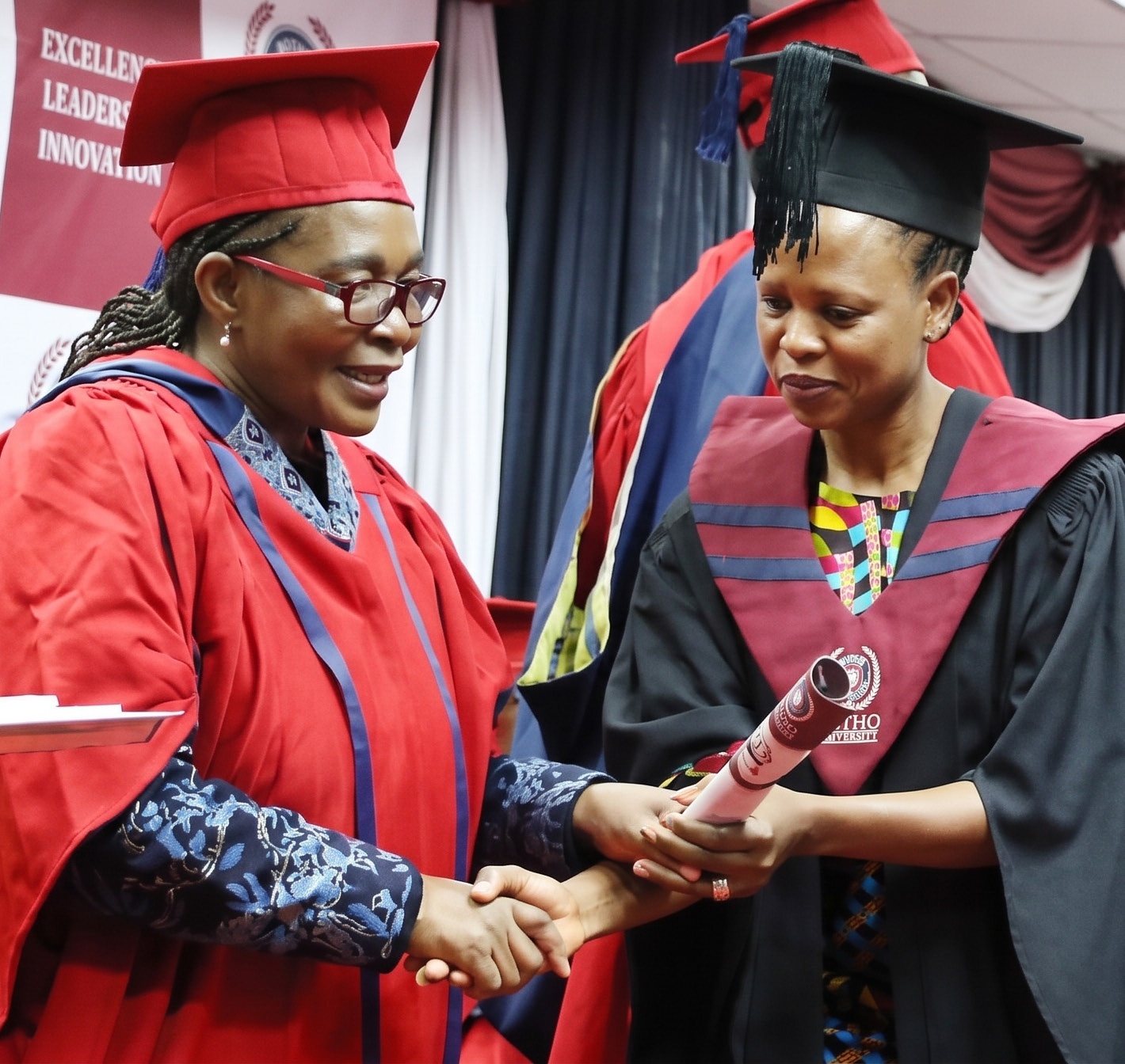 A graduate receiving recognition at a graduation ceremony